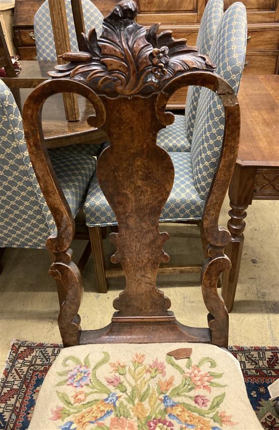 A pair of early 18th century Dutch carved walnut side chairs